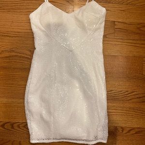 White sequin mini dress with cutouts. Size small